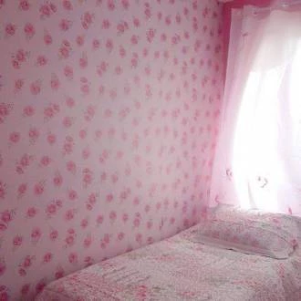 Papel de parede floral em rosas